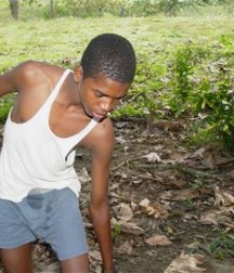 Black Boy hanging in the tree 5a534b7c5fb16.jpg
