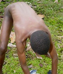 Black Boy hanging in the tree 5a534b82effed.jpg