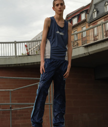 Cute skinny boy in shiny nylon 5f4b941341fea.jpg