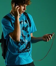 Alex with curly hair does a nice striptease twink tube