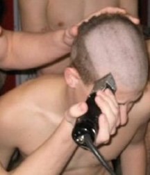 young boys with shaved heads