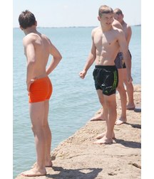 guys play at the beach
