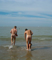 nudists on the beach 5ba79d73214fd.jpg