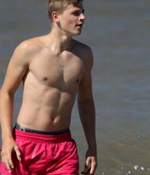 straight guys on the beach 5c8fa587d51bf.jpg