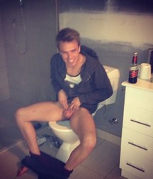 sitting on the toilet bowl 5cbc31737470c.jpg