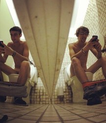 the boy is sitting on the toilet 5d2ae5cd76c5f.jpg