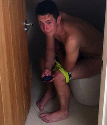 sitting on the toilet 5d96349ab693f.jpg