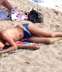 Relaxing under the summer sun twink tube 6292ab644d36e.jpg