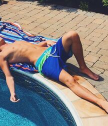 Relaxing under the summer sun twink tube 6292ab8f09014.jpg