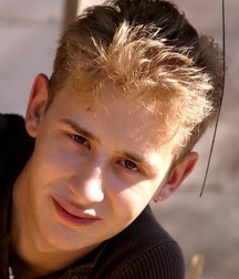 Kind boy at ruin 5b48ed688a7fb.jpg