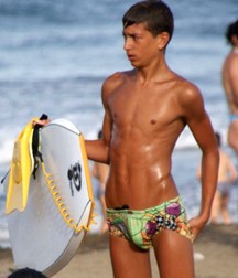 Bare chests and mostly speedos... 59d4526d9e93a.jpg