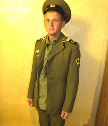 Country boy Misha in uniforme father