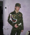 Semyon posing in military uniform