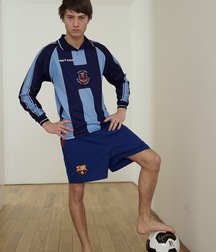 Soccer boy Tommy on the floor solo gay porn