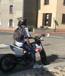 Teen bad boy Playing with motocycle  5b9156663e866.jpeg