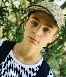 Green color cute boys twink tube 611809c7e209e.jpg