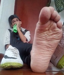 Sniffin the boys feet