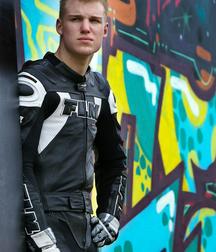 Biker in boots and leather 5db1c3db31fea.jpg