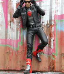 Biker in boots and leather 5db1c3e2af224.jpg
