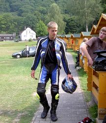 Biker in boots and leather 5db1c404c3920.jpg