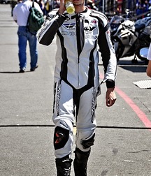 Biker in boots and leather 5db1c41677f52.jpg