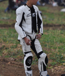 Biker in boots and leather 5db1c42781971.jpg