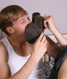 Tim taking boots off 5dbed1f662c4f.jpg