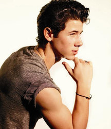 Nick Jonas: From Cutie to Stud 5da27a5f708c5.jpg