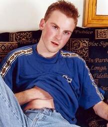 Sweet red head twink on a sofa cums gay porn