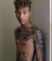 Blue and green-eyed black boys and men 5dc8cd2b6ef42.jpg