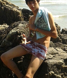 At the beach 5dced40f1dc9c.jpg