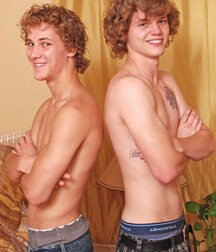 Two blond curly gay porn models have fun