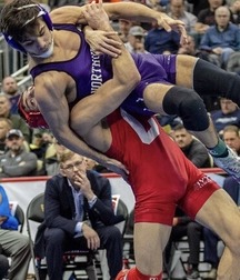 wrestling action 5d8e262de6542.jpg