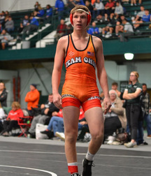 orange clad wrestlers 5e5535b309dbd.jpg