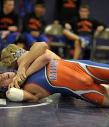 orange clad wrestlers 5e5535b3ac8eb.jpg