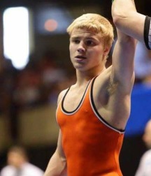 orange clad wrestlers 5e5535b645c3d.jpg