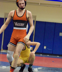 orange clad wrestlers 5e5535bb6c509.jpg