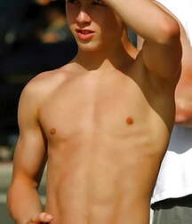Boys having fun summer waves twink tube