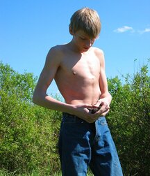 Boys Porn Cute blond teen Christian jerks off outdoors 62949a53a162a.jpg