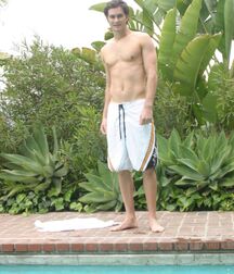24 y.o. hunk Mickey in a solo session boys by the pool 62a9adf1cd65f.jpg