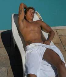 A handsome blond twink porn is having fun by the pool 62adffb53df85.jpg