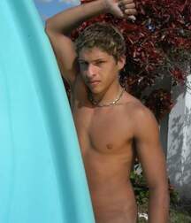 A handsome blond twink porn is having fun by the pool 62adffe085e64.jpg