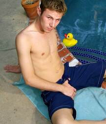 Cute twink porn Trent shows off by the pool 62b2f3ec2846f.jpg