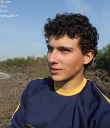 Curly and muscular lad Robert in a solo session by the river boys porn