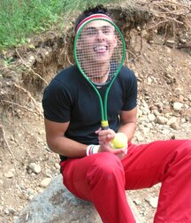 The smiling tennis player Fredi shows off outdoors 62b96824c2d2a.jpg