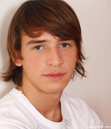 Two handsome Latin guys have fun during a photo session boys porn