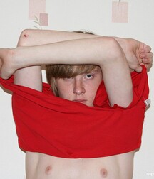 A red-haired and sad-looking guy in a solo session boys porn 62babb3a22885.jpg