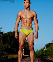 Yellow Speedos gay tube muscles 603e48675832a.jpg