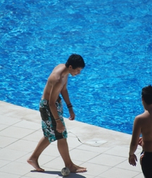 At the swimming pool 5bba74e5a12dd.jpg