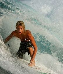 cute surfers in the pipe